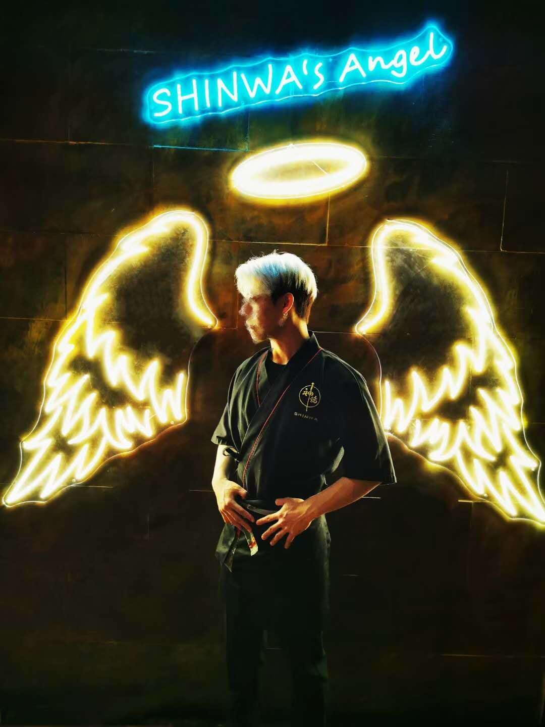 Shinwa’s Angel neon sign and illuminated wings at the restaurant